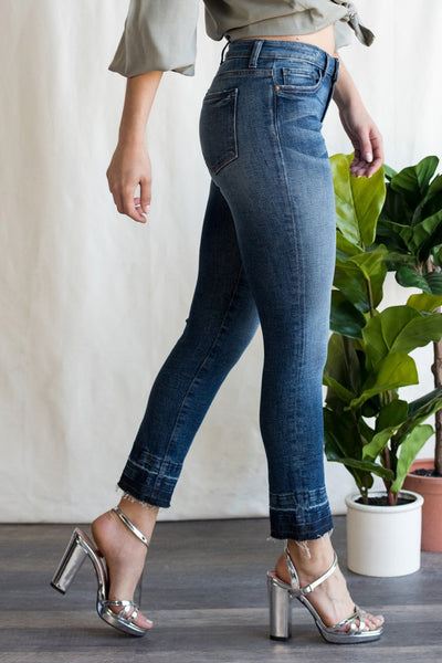 sneak peek distressed ankle jeans